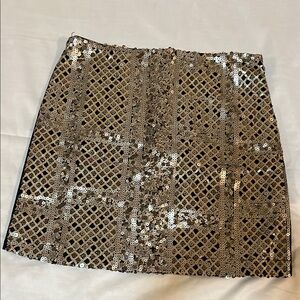 Romeo & Juliet Couture gold sequined black mini skirt